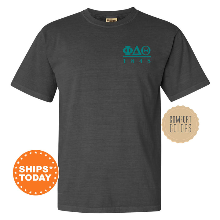 a black shirt with a green and blue logo