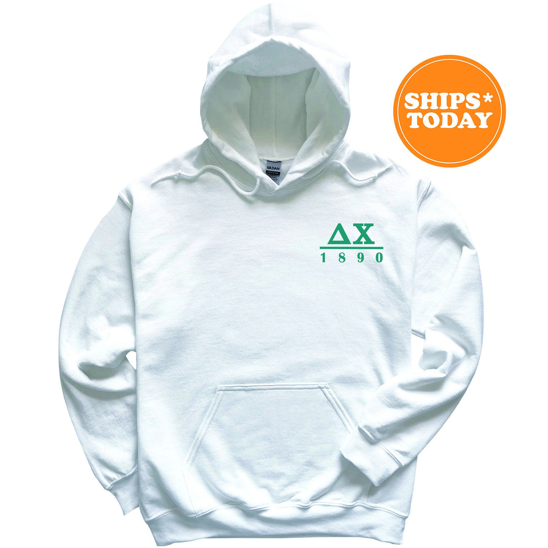 a white hoodie with a green logo on it