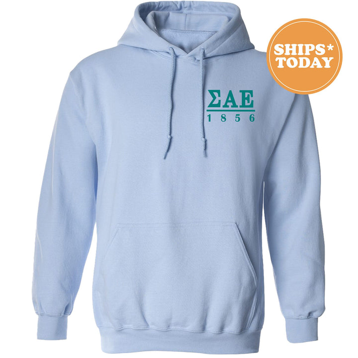 a blue hoodie with a green logo on it