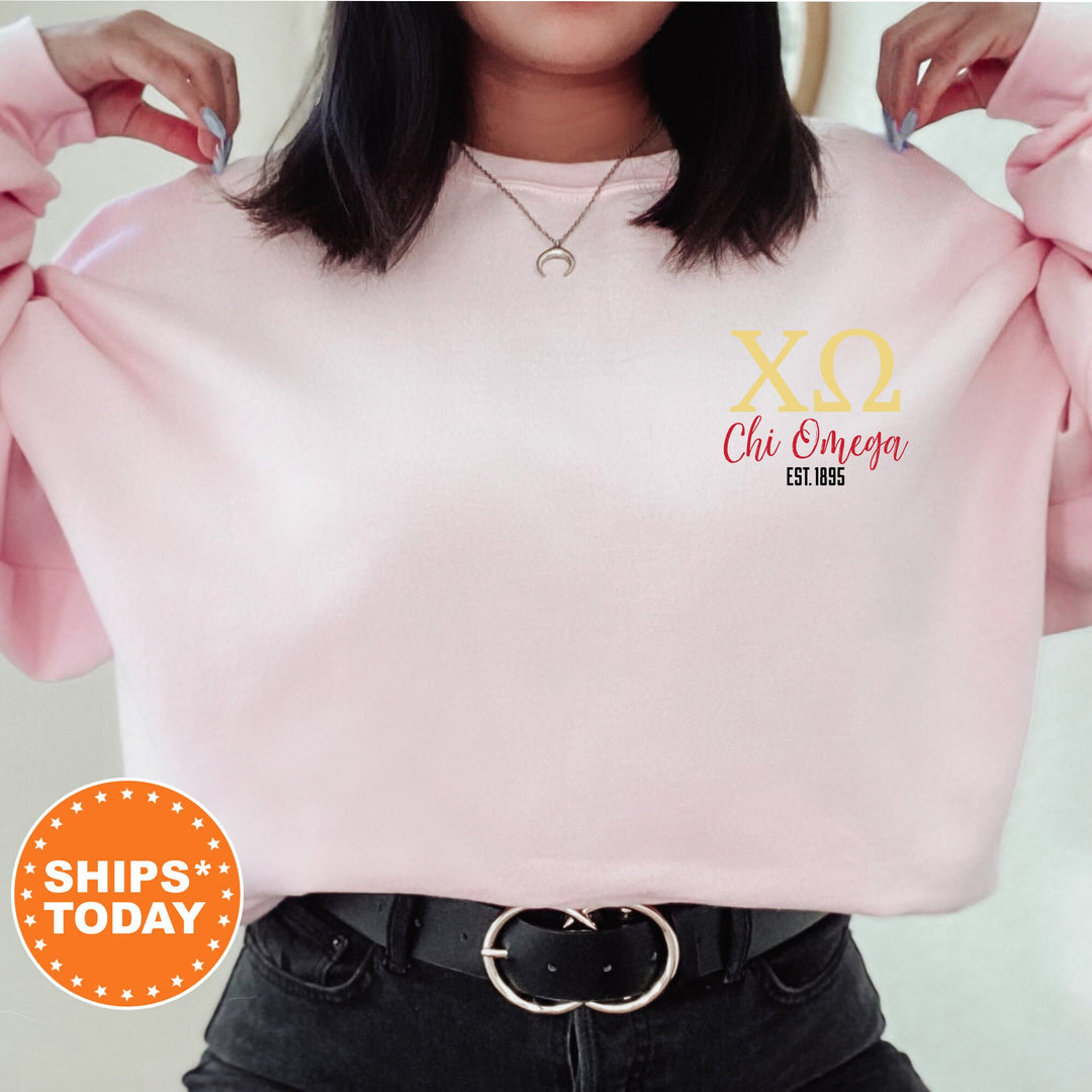 a woman wearing a pink sweatshirt with the xo chi chi chi logo on it