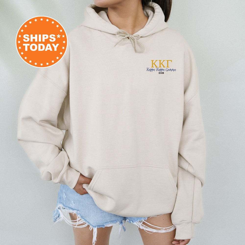 a woman wearing a kkt hoodie with the kkt logo on it