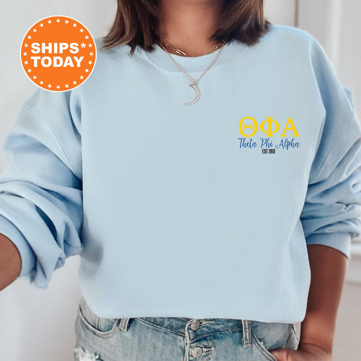 a woman wearing a blue sweatshirt with the words goba on it