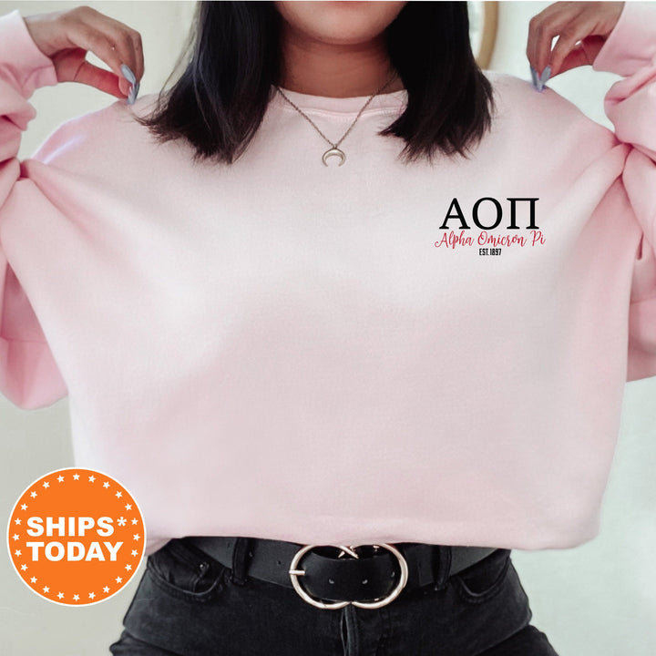 a woman wearing a pink sweatshirt with the word aot on it