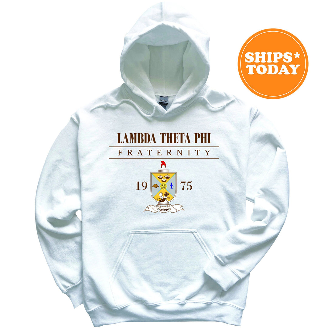 a white hoodie with a picture of a coat of arms on it