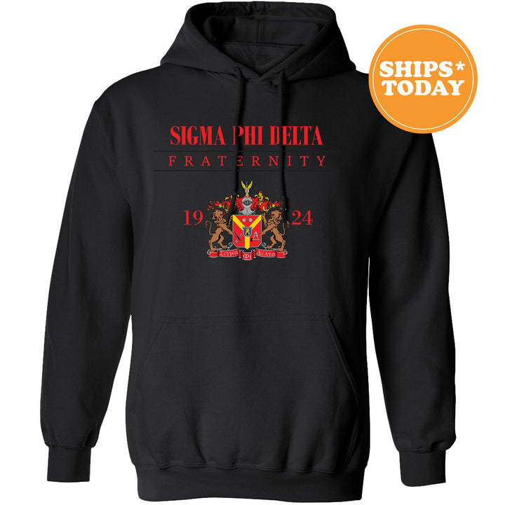 a black hoodie with an image of a coat of arms and a crown on
