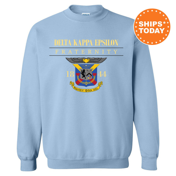 a light blue sweatshirt with a picture of a coat of arms