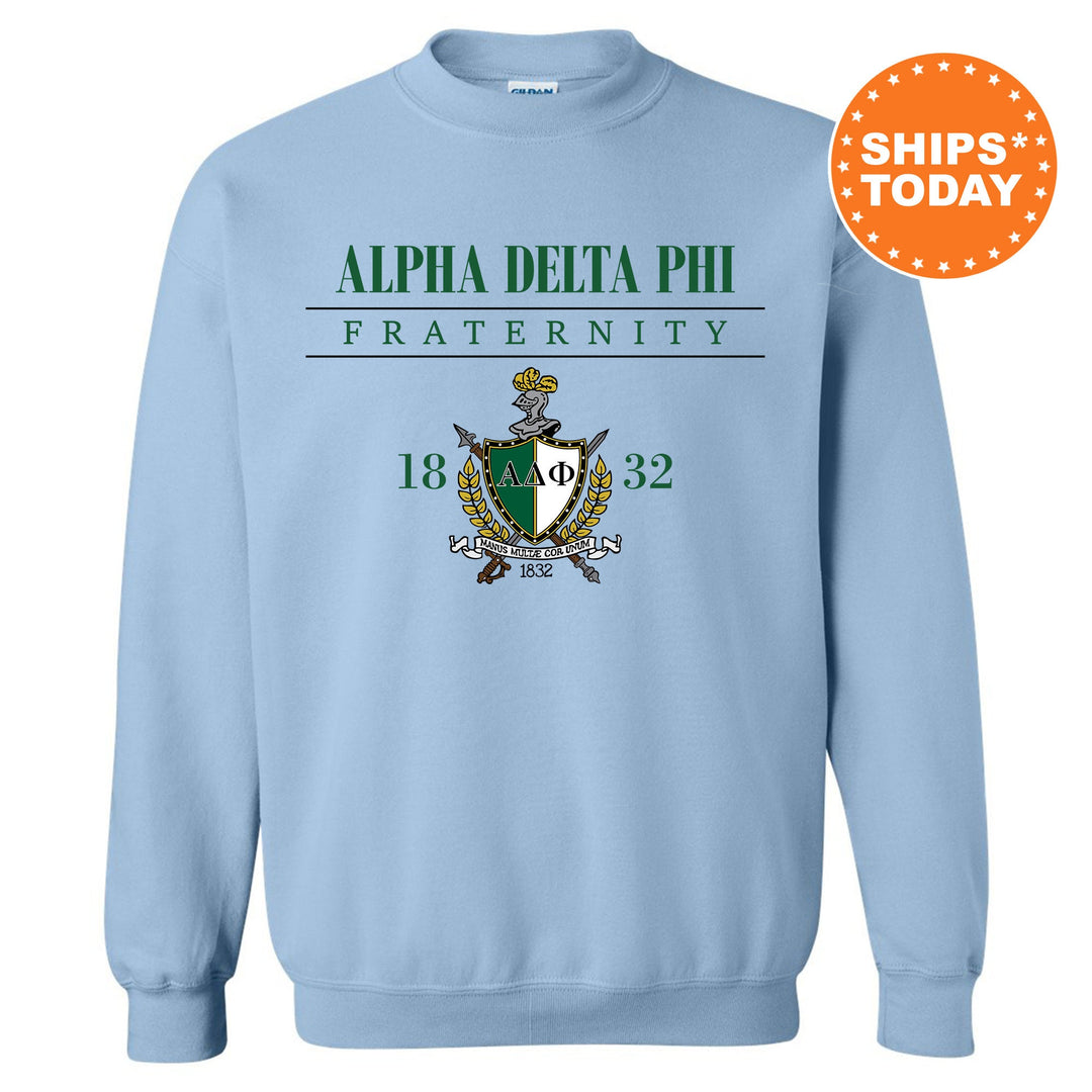 a light blue sweatshirt with the logo of a fraternity fraternity
