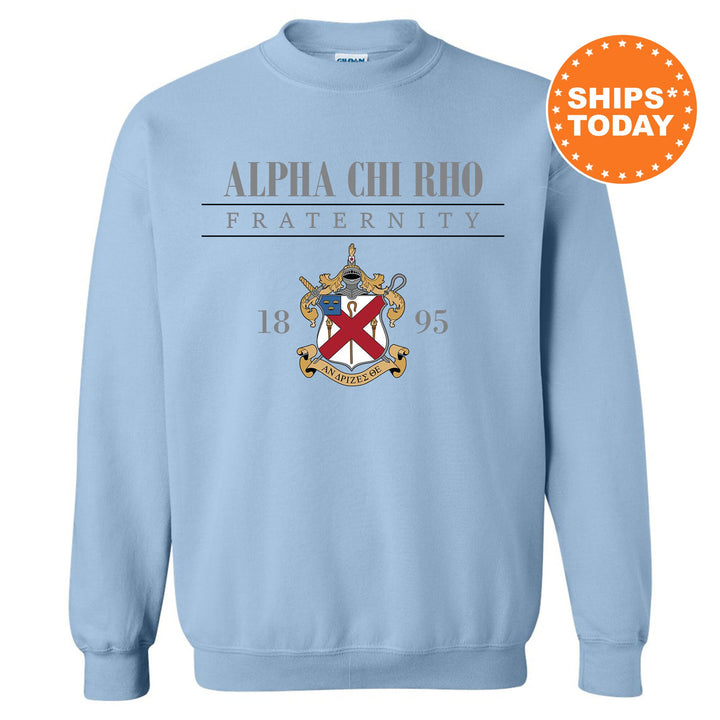 a light blue sweatshirt with an image of the emblem for the fraternity fraternity