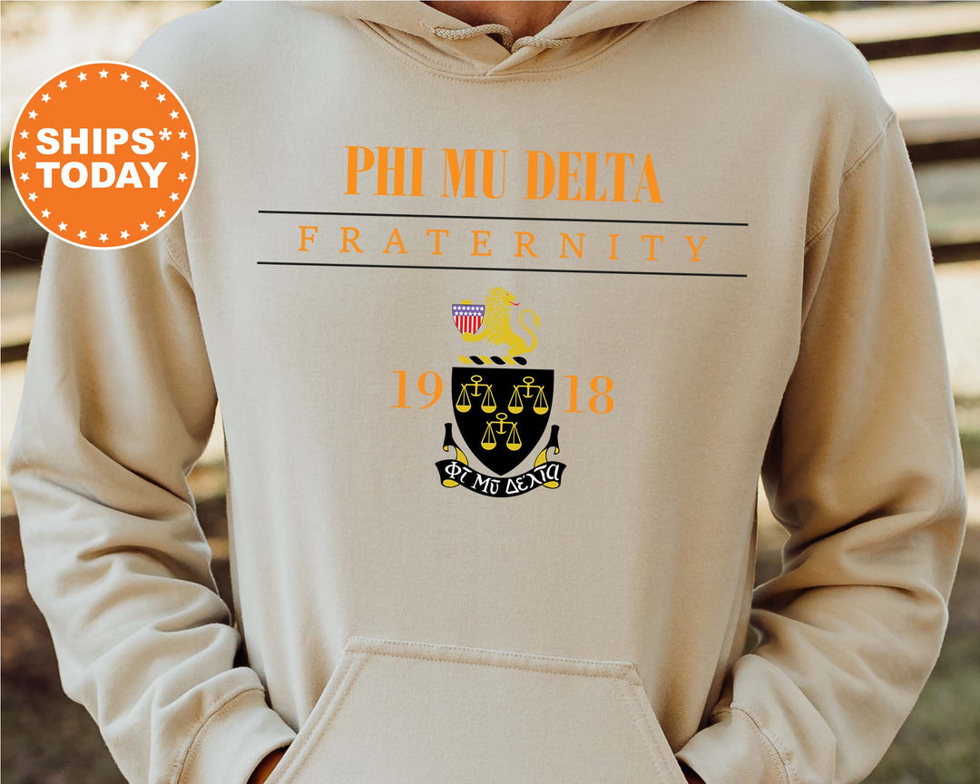 a person wearing a hoodie with the phi mu dicks fraternity on it