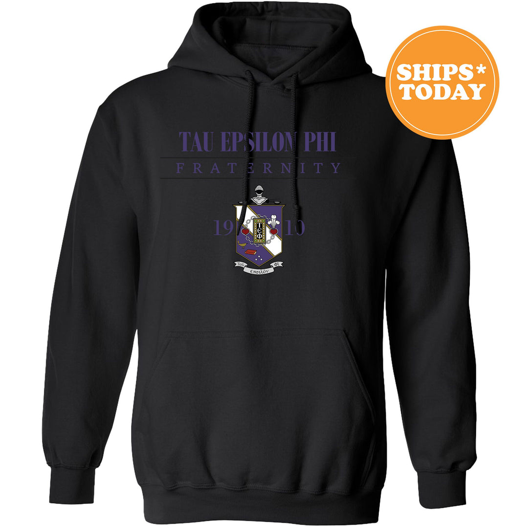 a black hoodie with the words tau epson phi fraternity printed on it