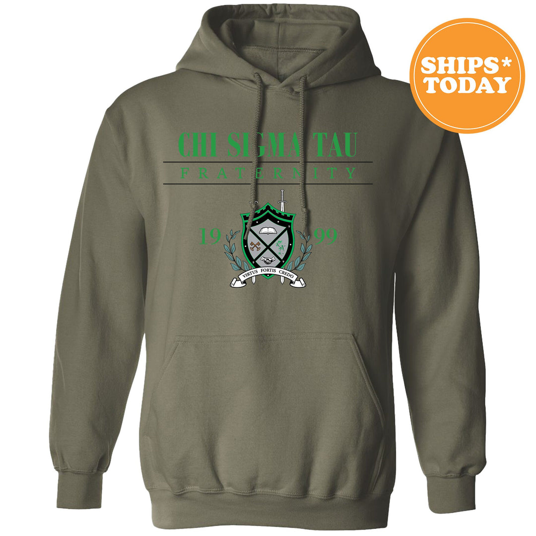 a hoodie with a green and white crest on it