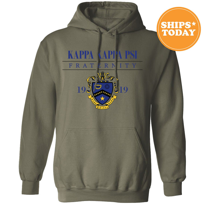 a gray hoodie with a blue and yellow crest on it