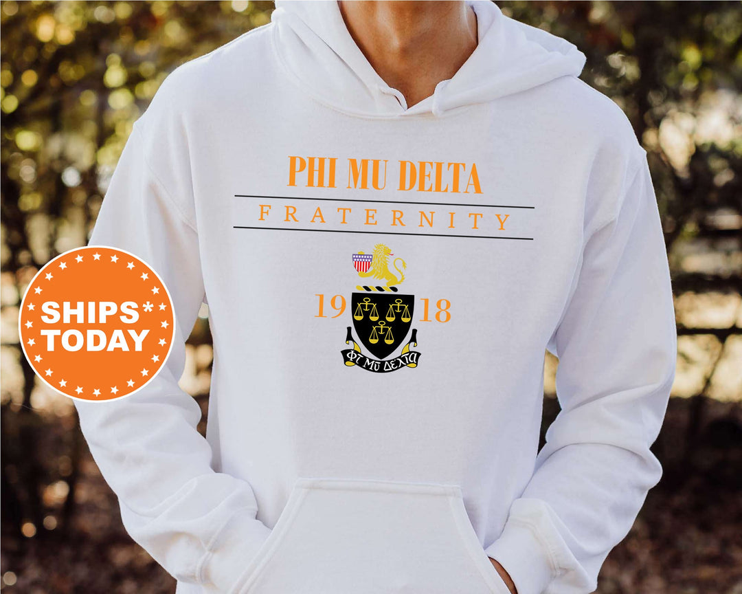 a man wearing a white phi mu delta fraternity hoodie