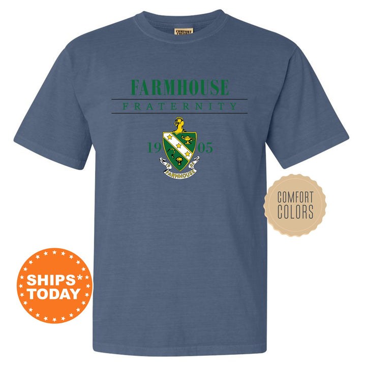 a blue t - shirt with the logo of farmhouse fraternity