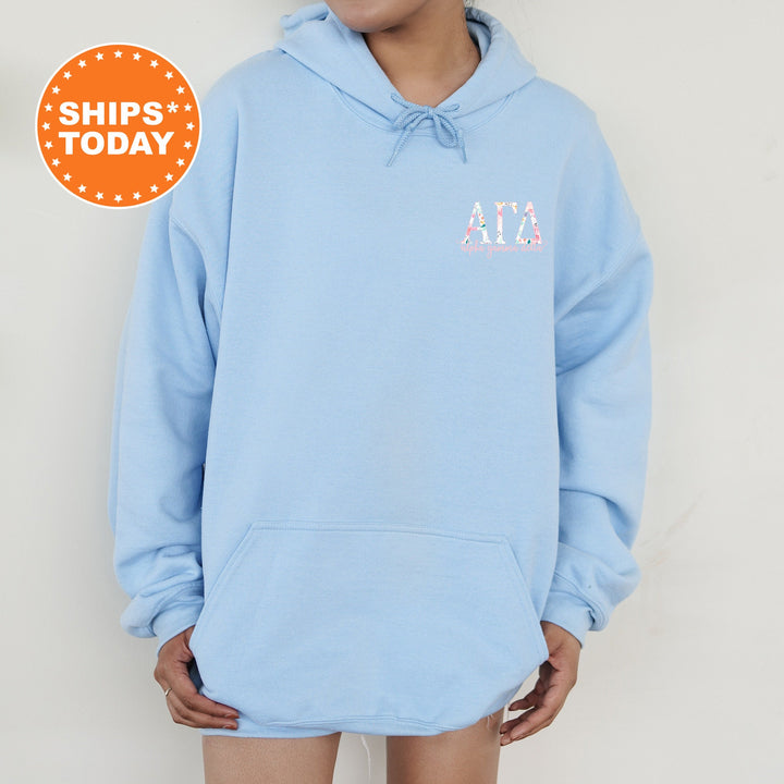 a woman wearing a blue hoodie with the word ai on it