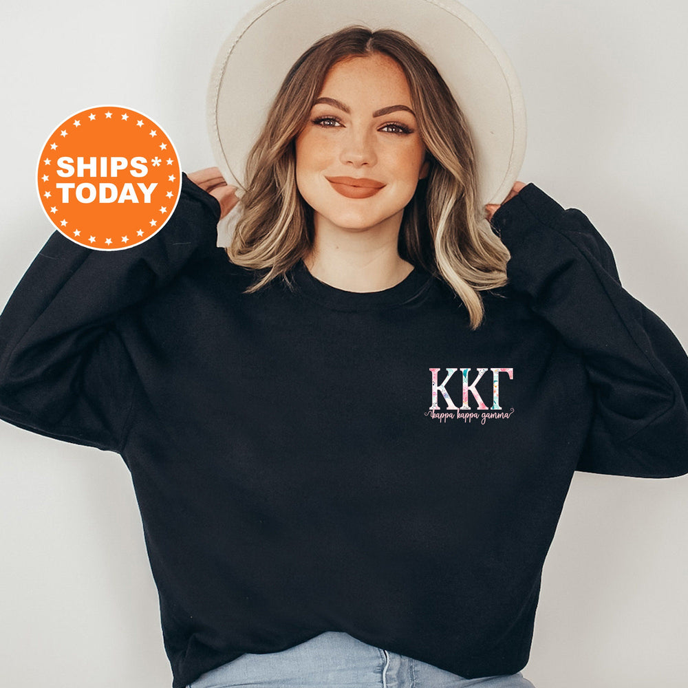 a woman wearing a black sweatshirt with the kkt logo on it