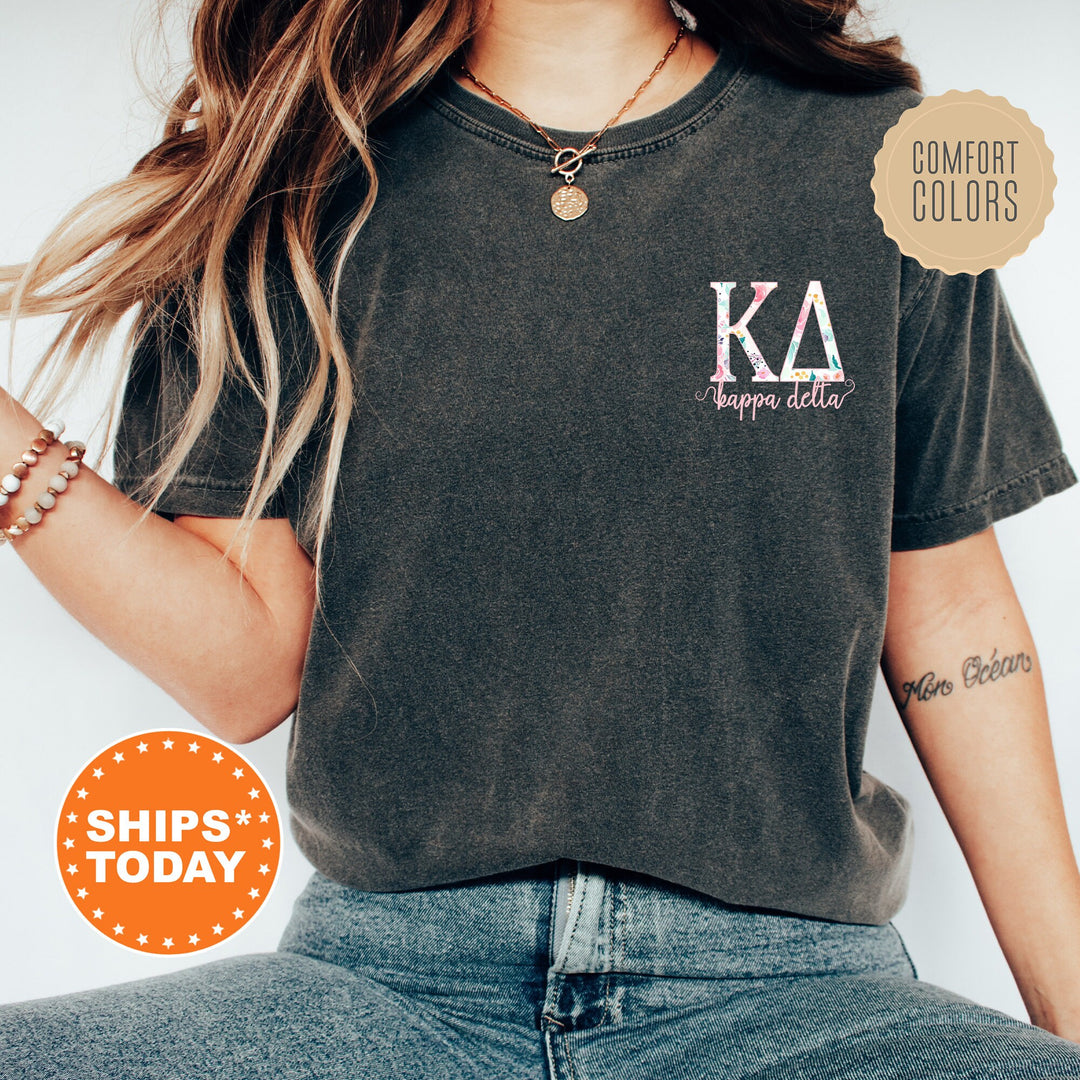 a woman wearing a t - shirt with the letters ka on it
