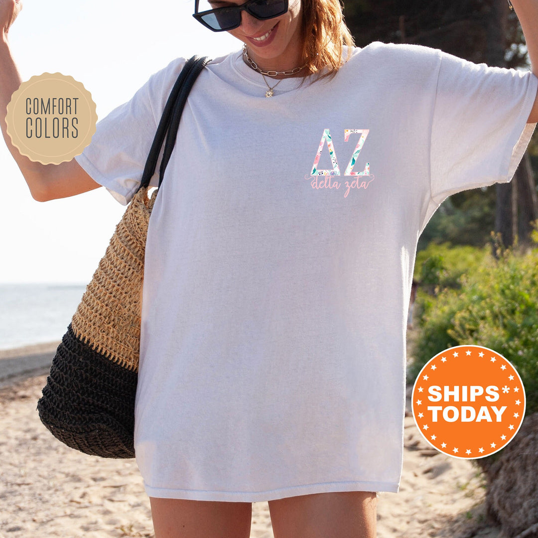 a woman wearing a white t - shirt with the letters a to z on it