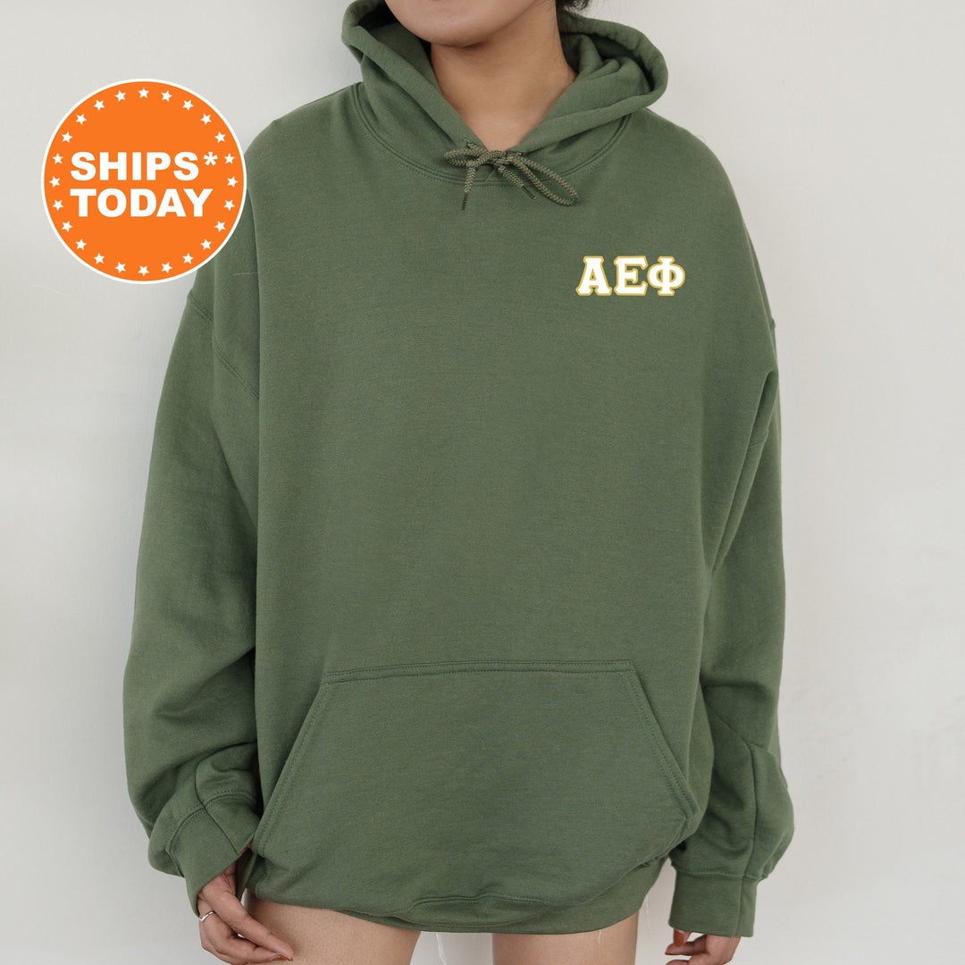 a woman wearing a green hoodie with the words aeq on it