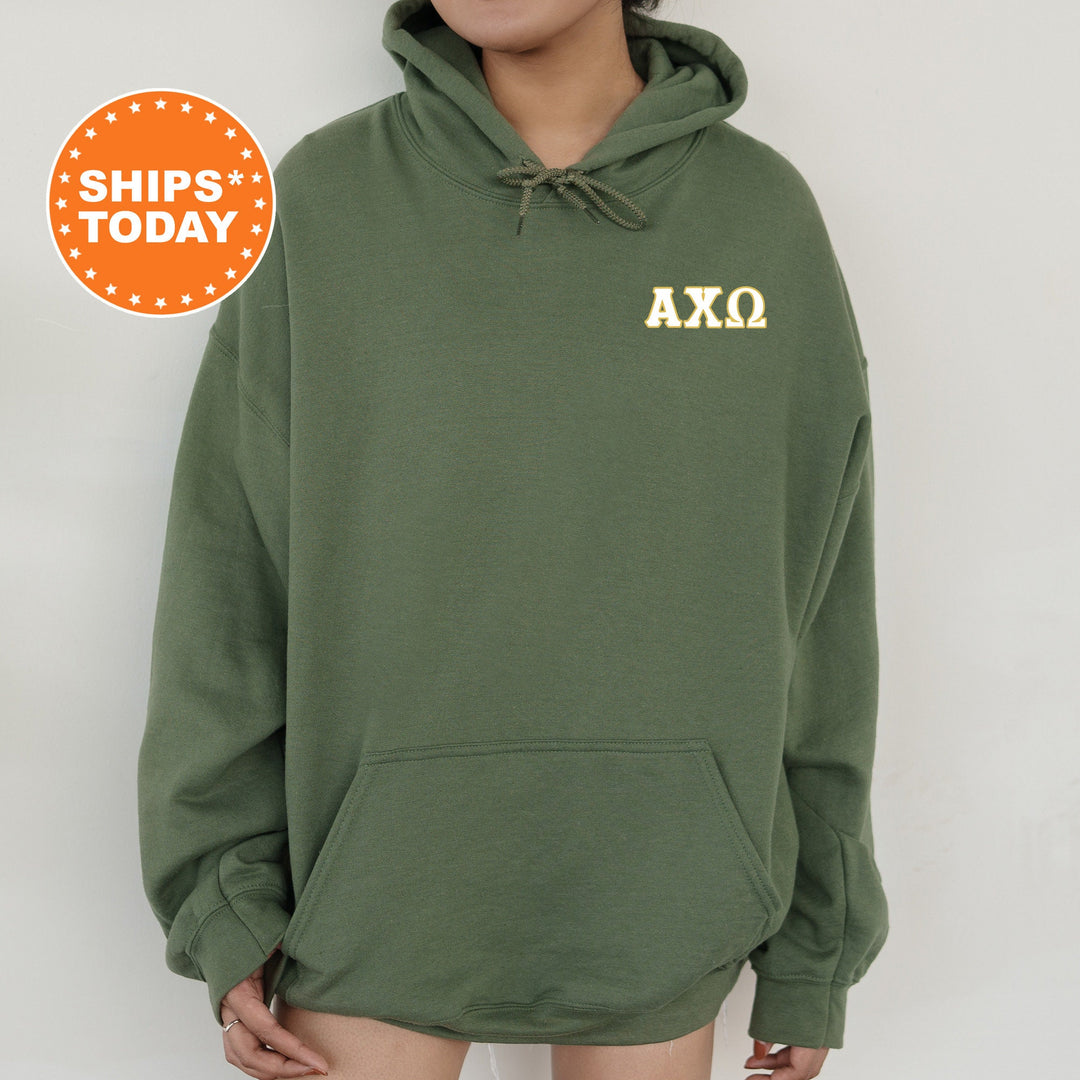 a woman wearing a green hoodie with the words axo printed on it