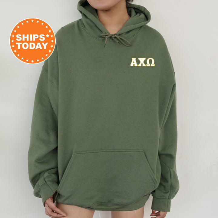 a woman wearing a green hoodie with the words axo printed on it