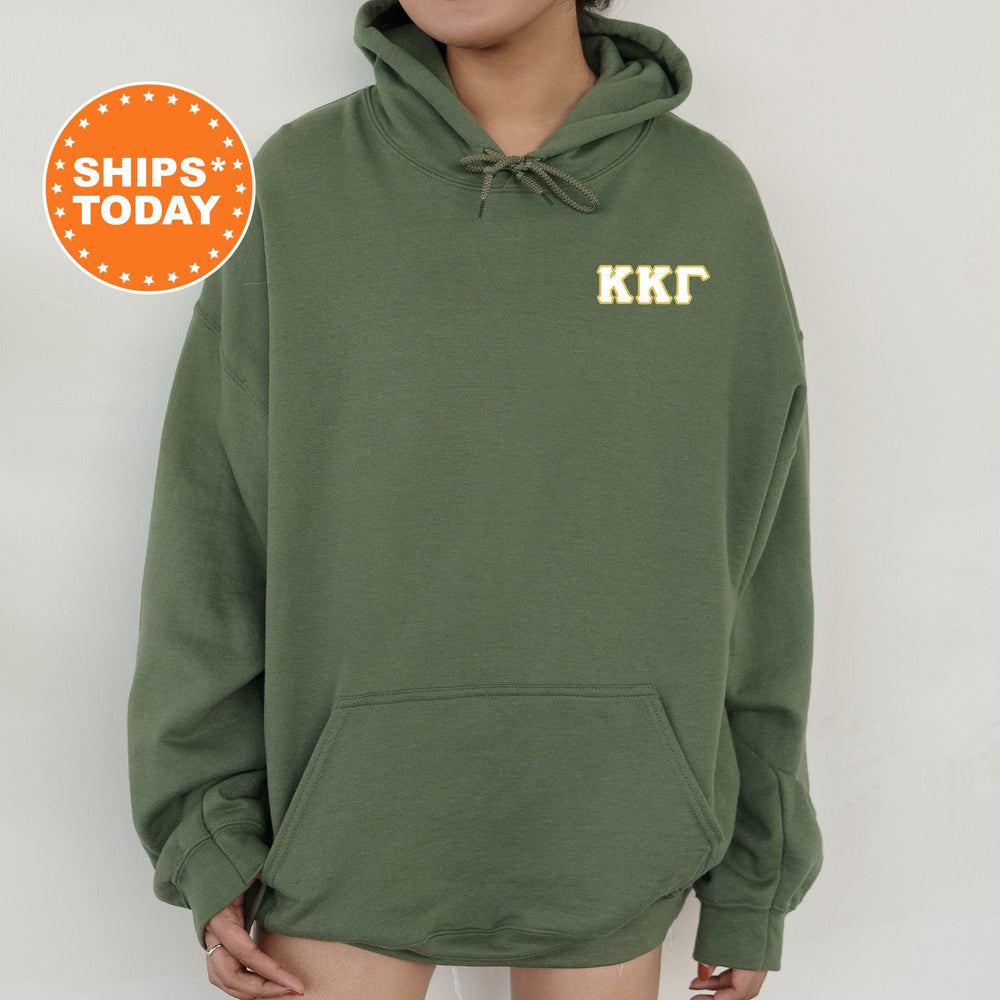 a person wearing a green hoodie with the words kett on it