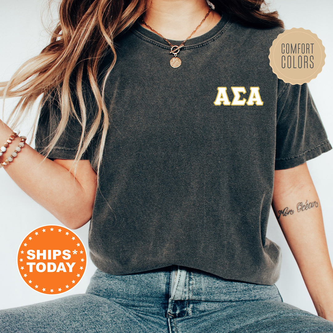a woman wearing a black shirt with the letters aea on it