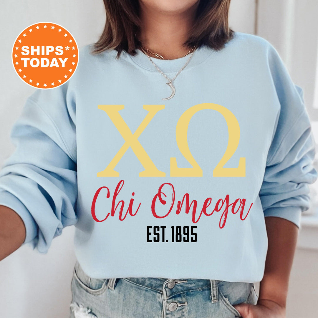 a woman wearing a sweatshirt that says x2 chi onega est 1989