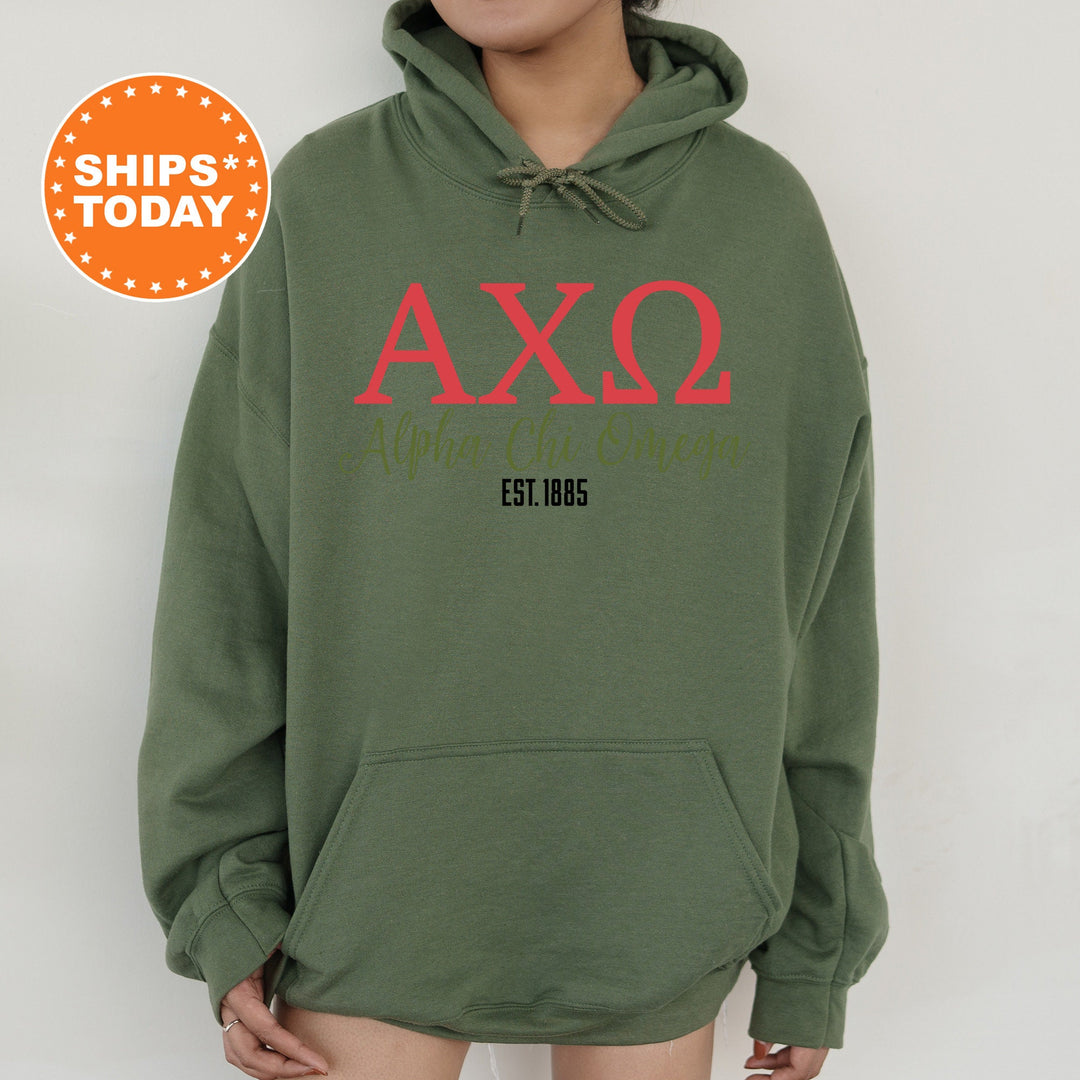a person wearing a green hoodie with the words axq on it