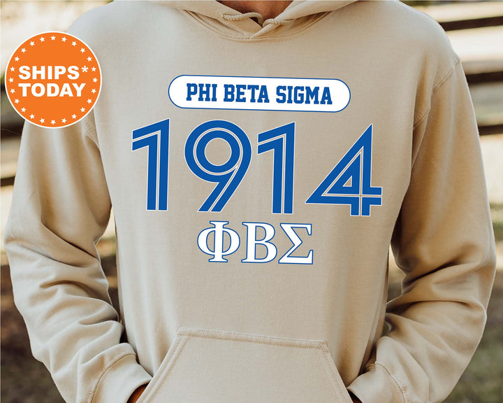 a man wearing a phi delta hoodie with the phi delta sign on it