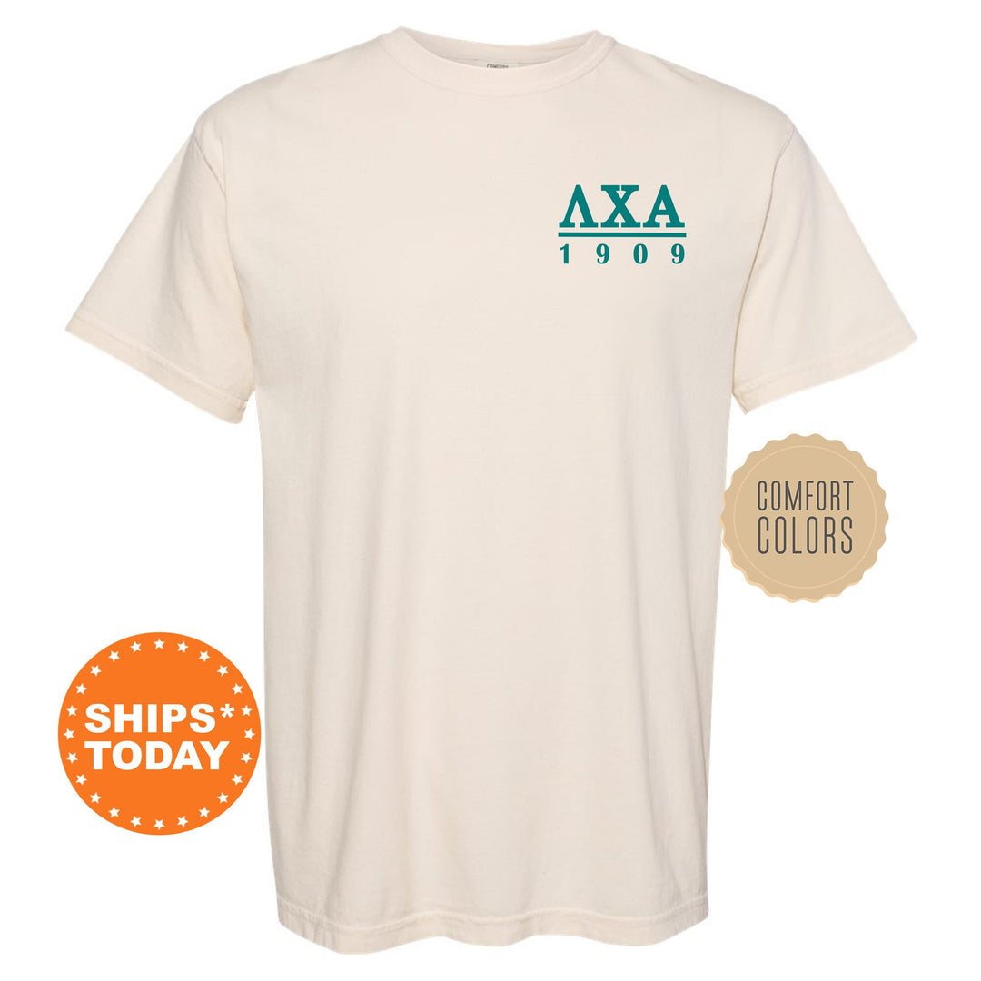 a white shirt with a green and blue logo