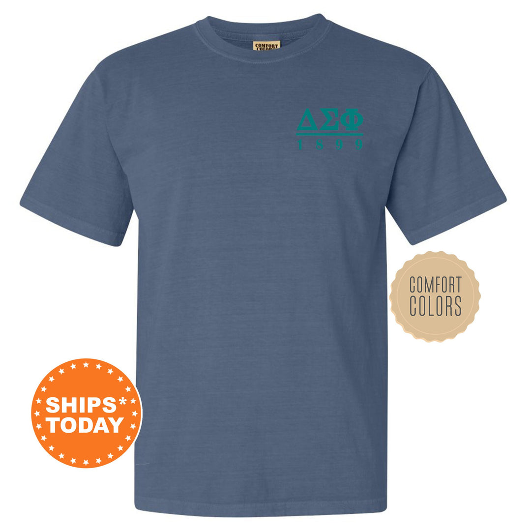 a blue t - shirt with a green logo on it