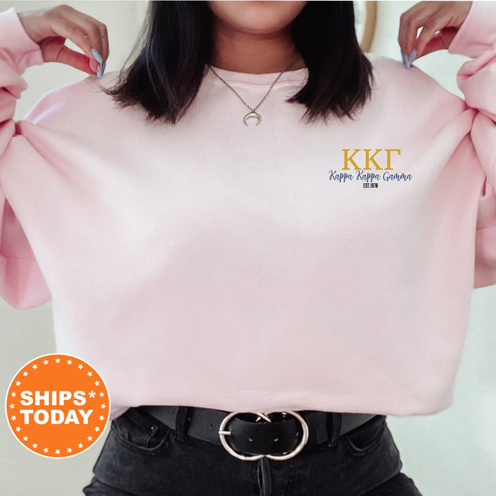 a woman is wearing a pink sweatshirt with the words kkt on it