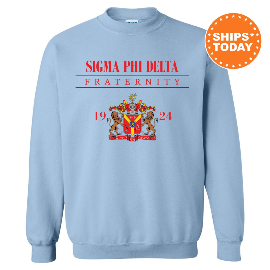 a light blue sweatshirt with a picture of a coat of arms on it