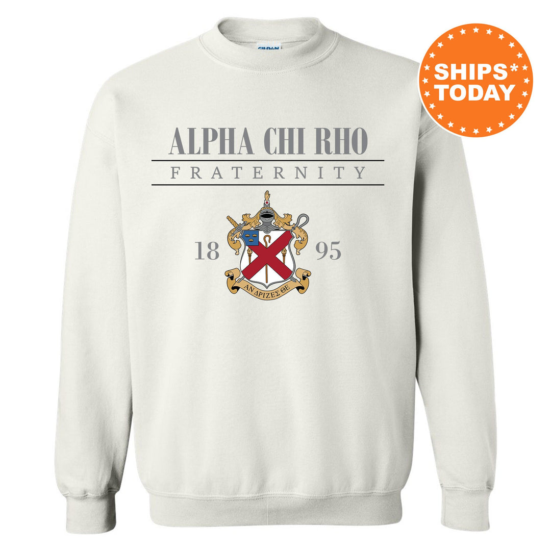 a white sweatshirt with an image of a coat of arms on it