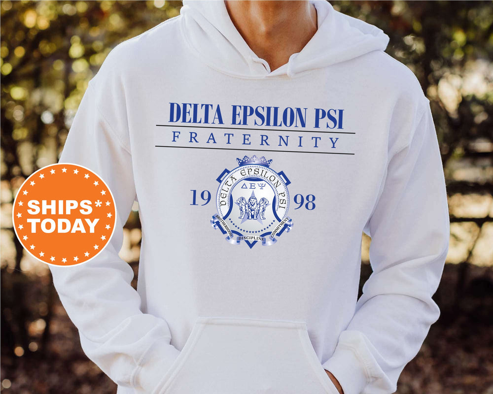 a person wearing a white hoodie with the delta epshon psi fraternity on