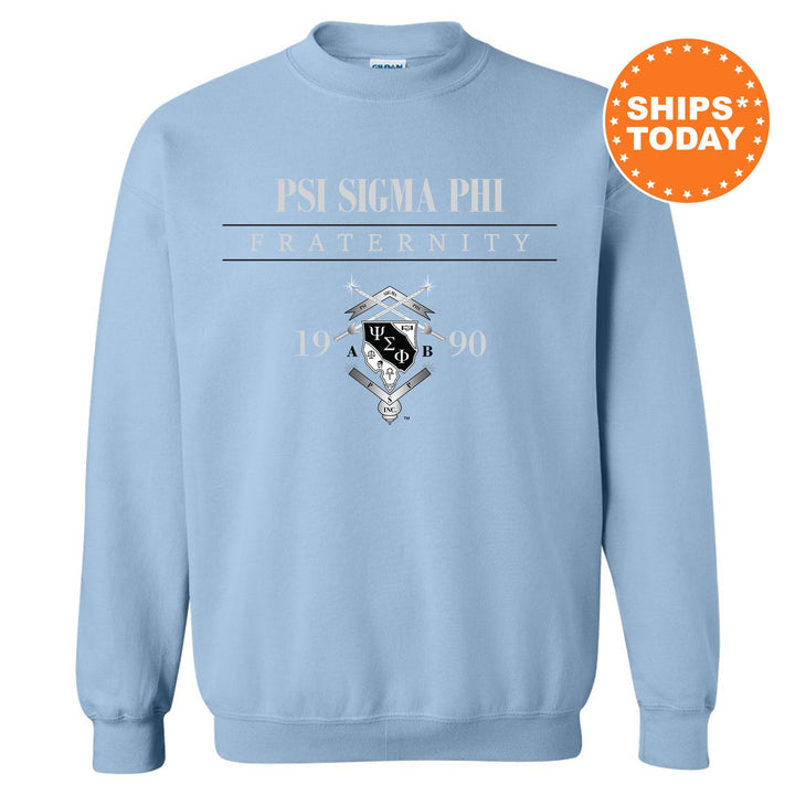 a light blue sweatshirt with a picture of the pisga phi fraternity on it