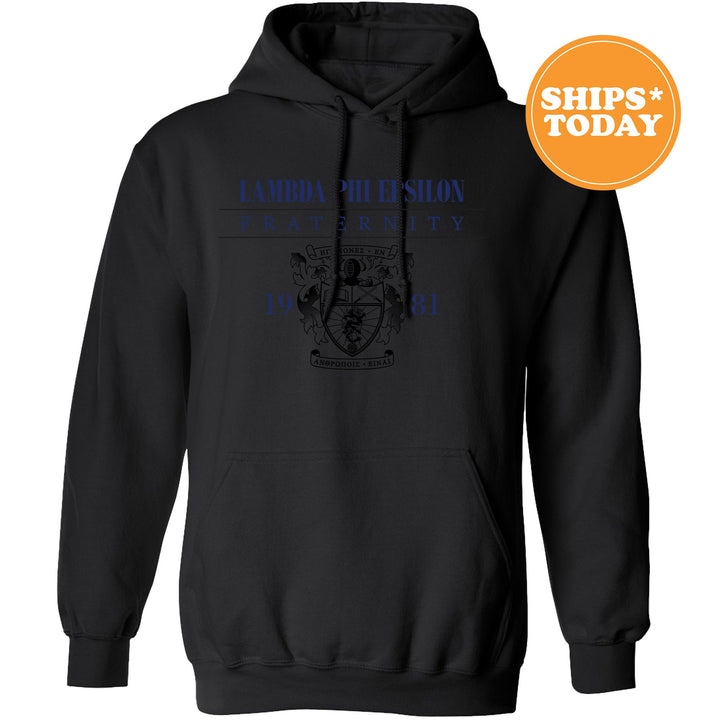 a black hoodie with a blue design on it