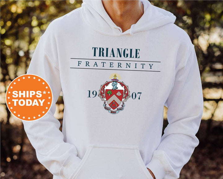 a man wearing a white hoodie with the triangle fraternity on it