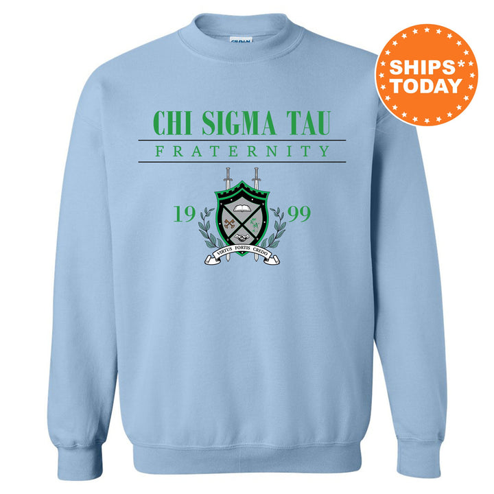 a light blue sweatshirt with a green and white crest on it