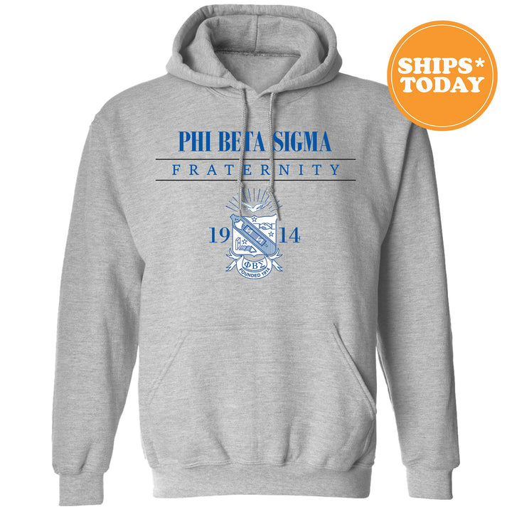 a grey hoodie with the phi bea siwa fraternity on it