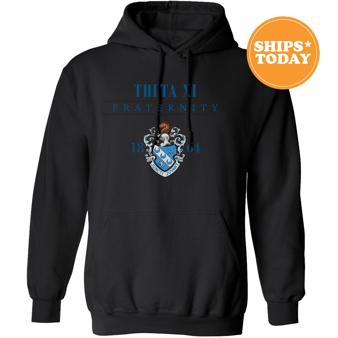 a black hoodie with a blue and white crest on it