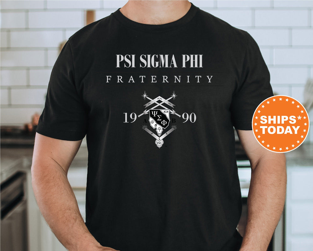 a man wearing a black tshirt that says psi sigma phi fraternity
