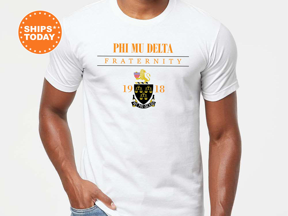 a man wearing a phi me delta fraternity t - shirt