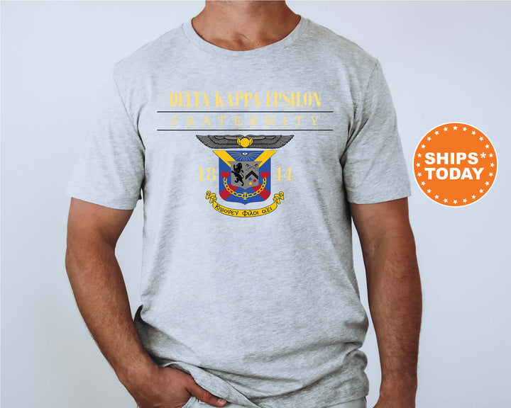 a man wearing a gray tshirt with an eagle on it