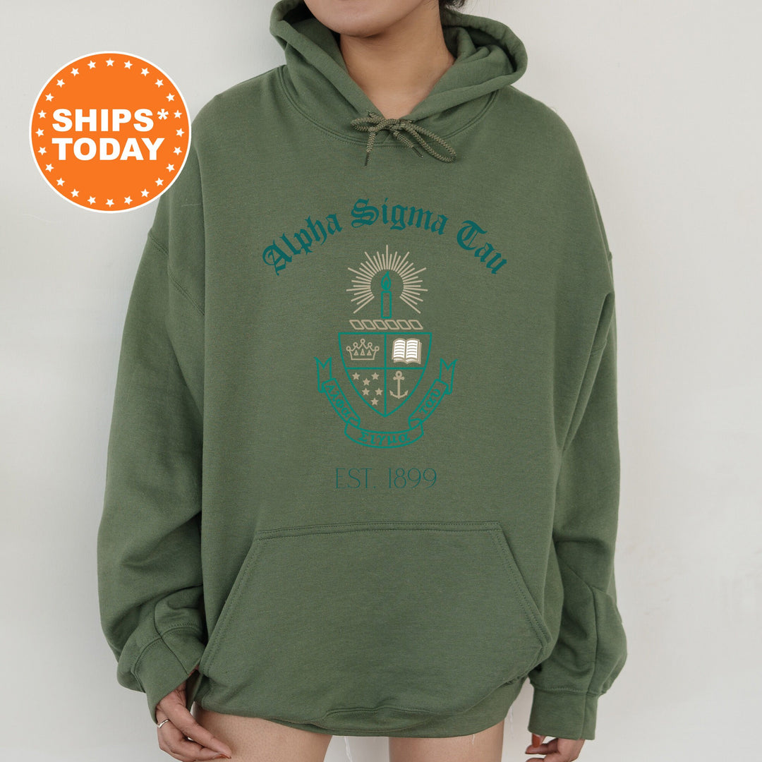 a person wearing a green hoodie with the words aloha signal club on