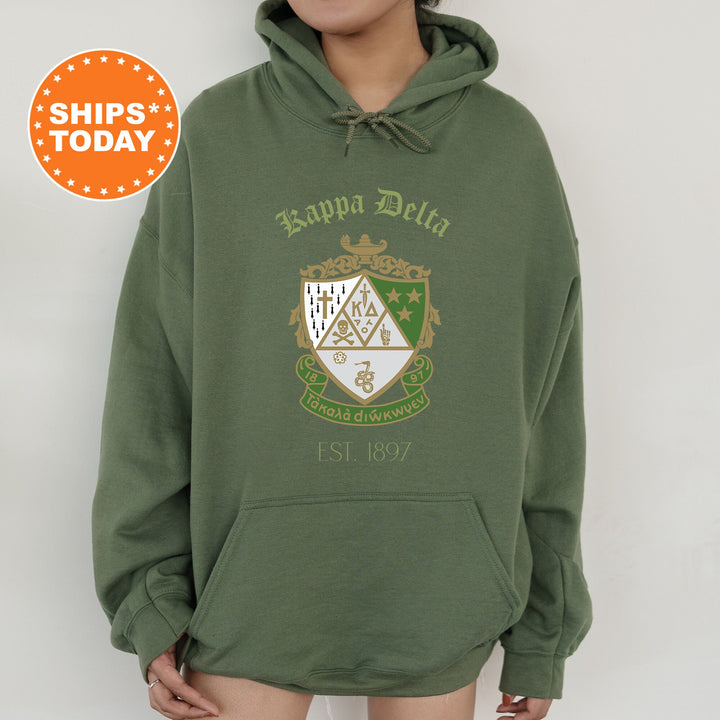 a person wearing a green hoodie with a white and green crest on it