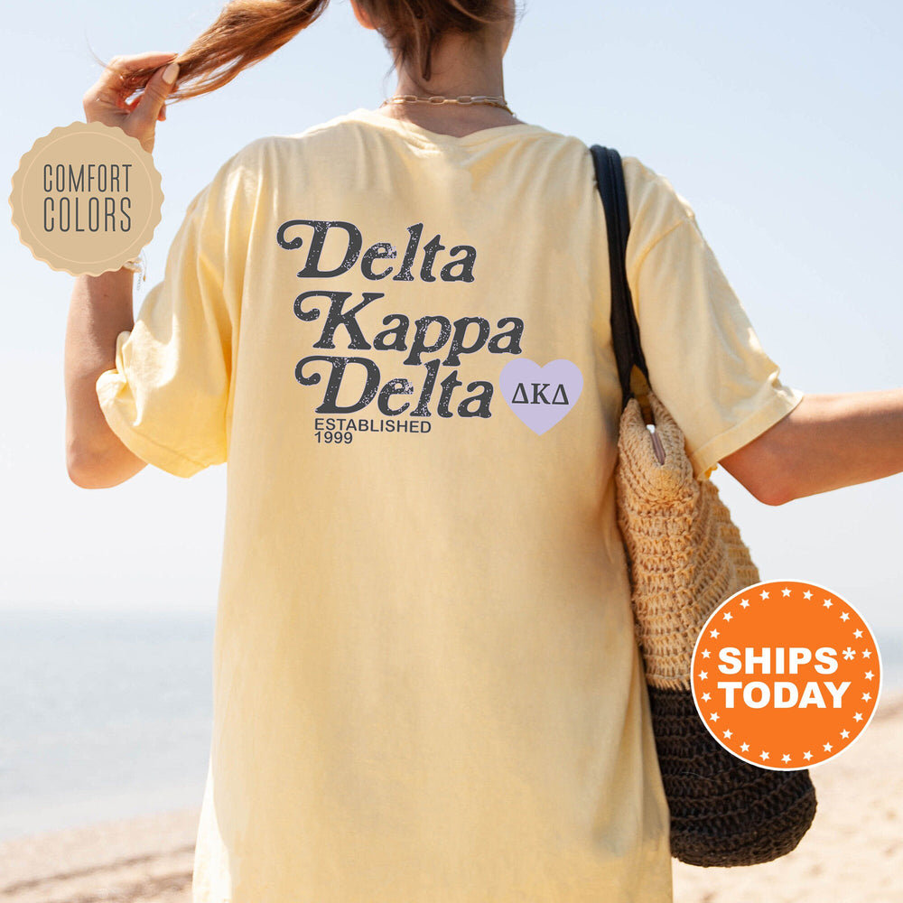 the back of a woman&#39;s shirt that says delta kappa delta