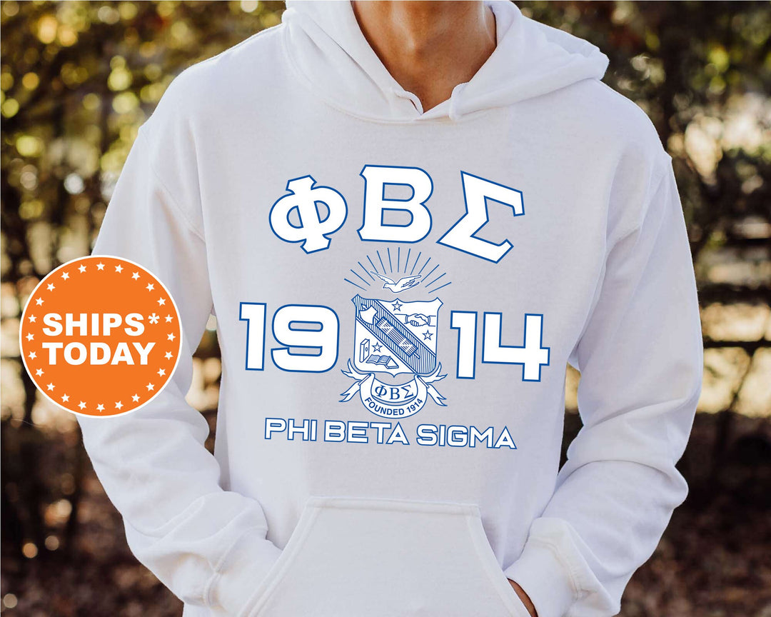 a person wearing a white hoodie with the phi eta insignia on it