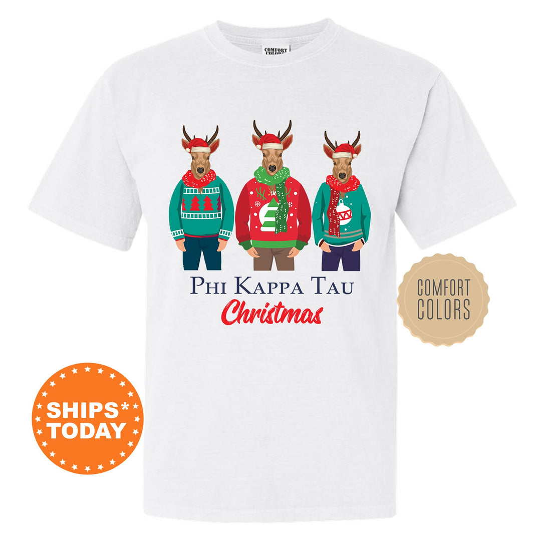 a white t - shirt with three reindeers wearing ugly sweaters